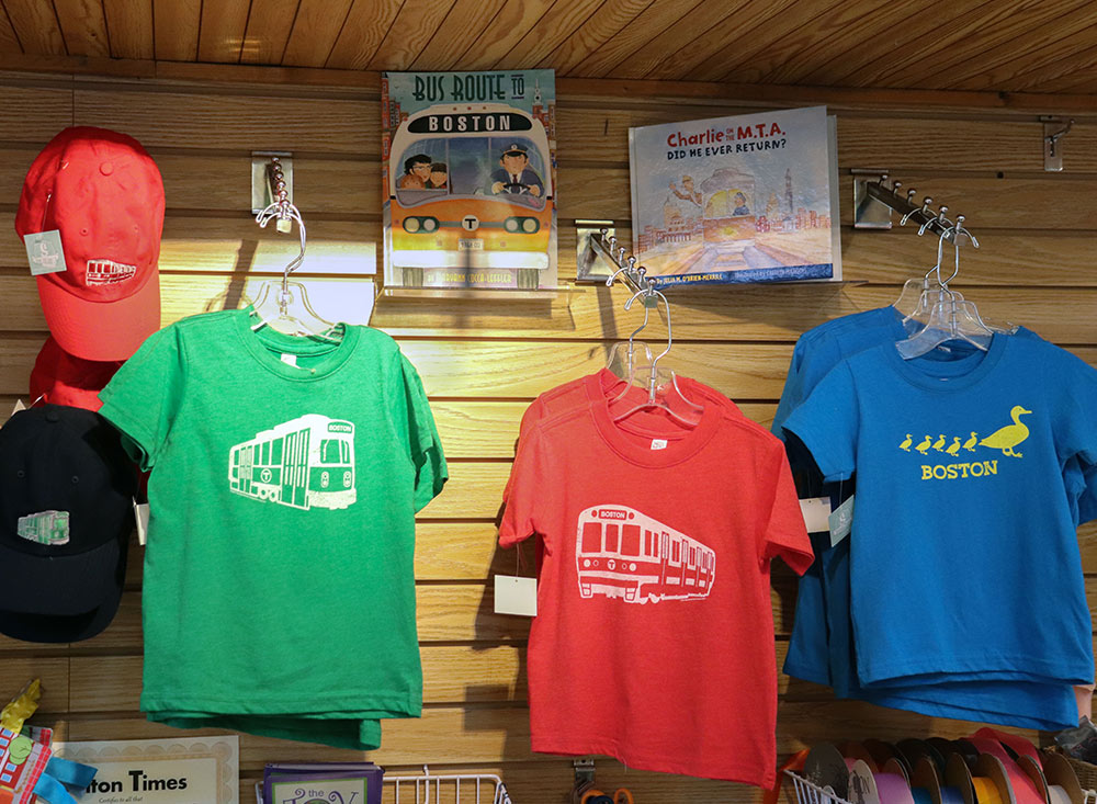 ss-18_Boston-Trolley-T-shirts-on-Wall-with-books